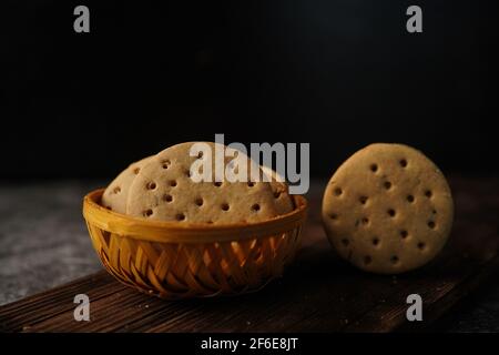 Homemade Indian Atta biscuits - Whole wheat cookies served with tea, selective focus Stock Photo