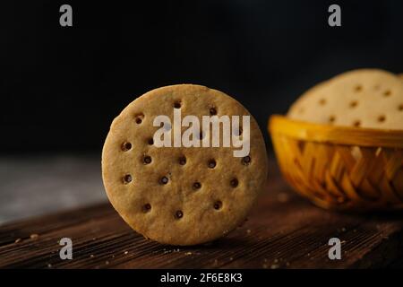 Homemade Indian Atta biscuits - Whole wheat cookies served with tea, selective focus Stock Photo