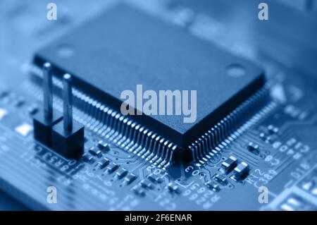 Closeup of electronic circuit board with chip. Macro with extremely shallow dof. Stock Photo