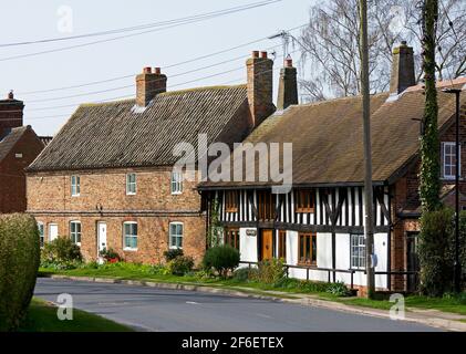 Houses in the village of Wheldrake, North Yorkshire, England UK Stock Photo