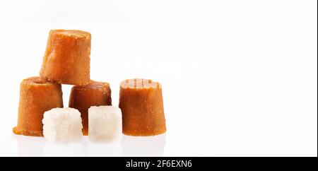 Sugar cane candy and refined sugar cubes - Saccharum officinarum Stock Photo