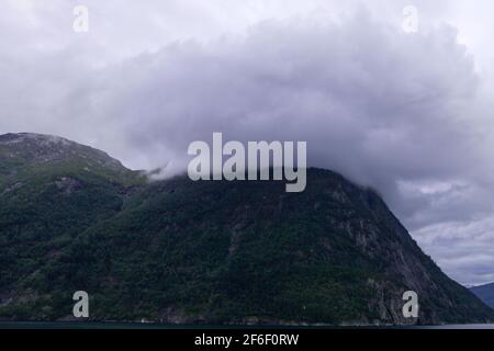 Storm cloud in Norway. Mountain landscape in the Dolomites mountain range Stock Photo