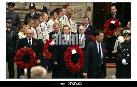 Tony Blair leads Michael Howard and Charles Kennedy out ,The Queen led thousands of war veterans in the Remembrance Service at the Cenotaph in London.pic David Sandison 9/11/2003 Stock Photo