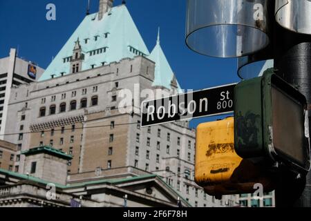 Robson Street street name sign. Robson Street is a famous shopping street  in downtown Vancouver Canada Stock Photo - Alamy