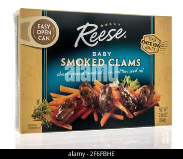 Winneconne, WI - 31 March 2021: A package of Reese baby smoked clams on an isolated background Stock Photo