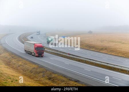 Tatarstan, Russia, Interstate Highway M7  - Nov 04th 2020. Trucks move along the federal highway to their destination. Direction indicator to the city Stock Photo