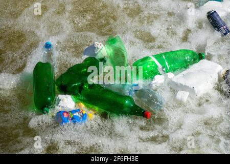 Plastic bottles floating Stock Photo