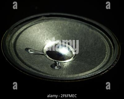 A loudspeaker on black background. Radio speaker. Stock Photo