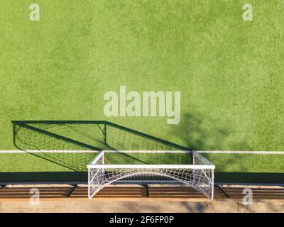 Green Soccer Court Detail .Outdoor sport ground with green surface for playing football  or soccer  in urban area, detail Stock Photo