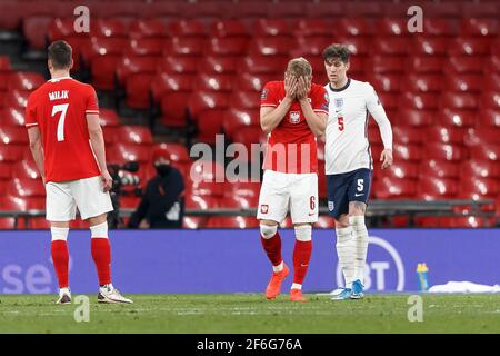 London, UK. 31st Mar, 2021. Rafal Augustyniak of Poland looks dejected after missing a late chance during the FIFA World Cup 2022 Qualifying Group I match between England and Poland at Wembley Stadium on March 31st 2021 in London, England. (Photo by Daniel Chesterton/phcimages.com) Credit: PHC Images/Alamy Live News Stock Photo