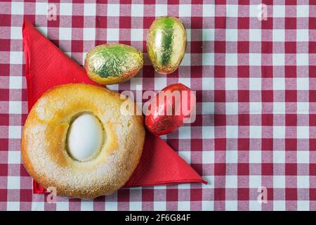 A typical food of the Spanish pastry is the Mona de Pascua. It is an Easter cake whose tasting symbolizes that Lent and its abstinence’s are over. Con Stock Photo