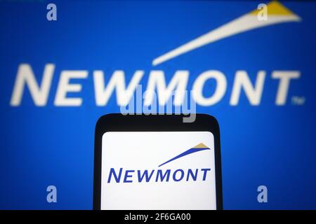 Ukraine. 31st Mar, 2021. In this photo illustration, a Newmont Corporation logo of a gold mining company seen displayed on a smartphone and a pc screen. (Photo by Pavlo Gonchar/SOPA Images/Sipa USA) Credit: Sipa USA/Alamy Live News Stock Photo