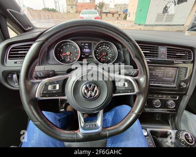 basra, Iraq - january 27, 2019:  photos behaind the car steering wheel Stock Photo