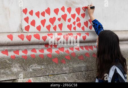 London, UK. 31st Mar, 2021. LONDON, UK. MARCH 31ST: The National Covid-19 Memorial Wall on London's South Bank on Wednesday 31st March 2021. (Credit: Tejas Sandhu | MI News) Credit: MI News & Sport /Alamy Live News