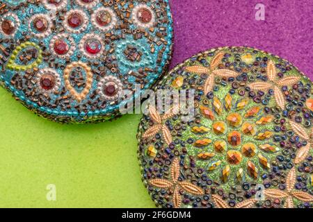 abstract flat lay with mosaic and lime green and purple Stock Photo