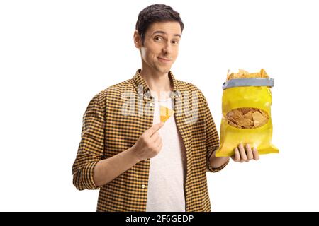 Guy holding a pack of tortilla chips isolated on white background Stock Photo