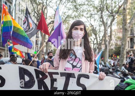 Barcelona, Catalonia, Spain. 31st Mar, 2021. Protester is seen with placard.On the International Transgender Day of Visibility, March 31, groups and collectives of transgender struggle, will be in the streets of Barcelona to vindicate trans rights and protest against transphobia and discrimination Credit: Thiago Prudencio/DAX/ZUMA Wire/Alamy Live News Stock Photo