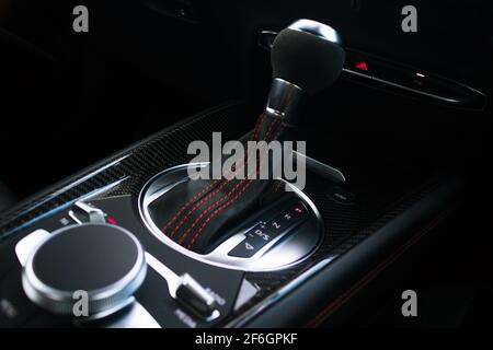 A 2017 Audi TTRS With Alcantara inserts And Black Leather Red Stitching Automatic Gear Stick WIth Carbon Fibre Centre Console Surround Stock Photo