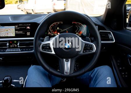 A 2019 BMW 3 Series G20 With Black Leather Multi Function Heated Steering Wheel With Aluminum Inserts Stock Photo