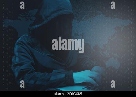 Hacker computer binary code system use laptop on world maps background. Stock Photo