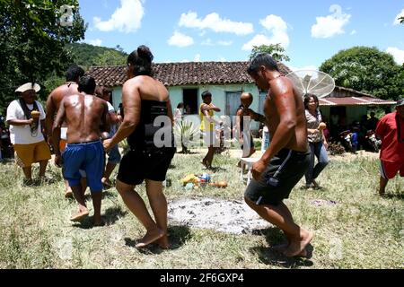 Itaju do Colonia, Bahia, Brazil - February 24, 2012: Indians of the Pataxo-ha-ha-hae ethnicity perform traditional dance during the funeral of an Indi Stock Photo