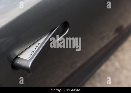 The jaguar Logo On The Door Handle Of A 2013 Jaguar F Type V8 S Stock Photo