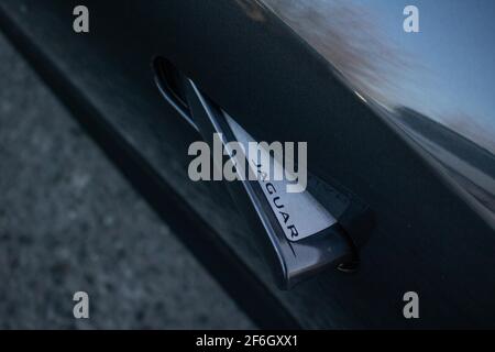 The jaguar Logo On The Door Handle Of A 2013 Jaguar F Type V8 S Stock Photo