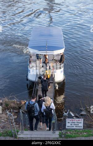 PRAGUE - March 31: Ferry Holka 2 transports passengers from district Karlin to district Holesovice on October 1, 2017 on Vltava river, Czech Republic. Stock Photo