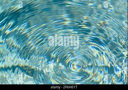 Concentric ripples on water surface Stock Photo