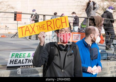 Seattle, USA. 31th Mar, 2021. Late in the day people protesting at City Hall calling for rent forgiveness and extension on the rent moratorium. Over 5 million Americans have missed rent payments since the Covid-19 pandemic hit the United States. Credit: James Anderson/Alamy Live News Stock Photo