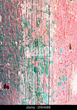 Background vintage weathered old wood board strip paint chipped open peeling off lines furrows cracks renovation renewal wall wooden cladding paneling Stock Photo