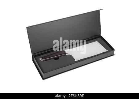 Stainless steel butcher's knife on black box. Meat cleaver knife. Stock Photo