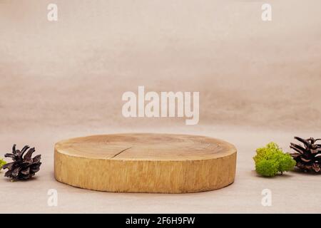 Wooden saw cut podium, template, mock up for presentation products. Stock Photo