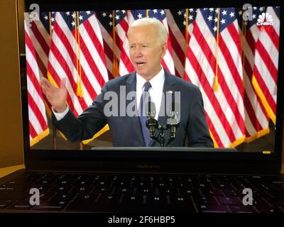 Arlington. 31st Mar, 2021. Photo taken in Arlington, Virginia, the United States, on March 31, 2021 shows a screen displaying U.S. President Joe Biden delivering a speech in Pittsburgh, Pennsylvania in a live stream provided by CNBC. U.S. President Joe Biden on Wednesday unveiled a 2-trillion-U.S.-dollar infrastructure investment plan, touting it as a "once-in-a-generation" investment in the country. Credit: Liu Jie/Xinhua/Alamy Live News Stock Photo