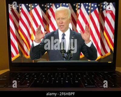 Arlington. 31st Mar, 2021. Photo taken in Arlington, Virginia, the United States, on March 31, 2021 shows a screen displaying U.S. President Joe Biden delivering a speech in Pittsburgh, Pennsylvania in a live stream provided by CNBC. U.S. President Joe Biden on Wednesday unveiled a 2-trillion-U.S.-dollar infrastructure investment plan, touting it as a "once-in-a-generation" investment in the country. Credit: Liu Jie/Xinhua/Alamy Live News Stock Photo