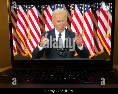Arlington. 31st Mar, 2021. Photo taken in Arlington, Virginia, the United States, on March 31, 2021 shows a screen displaying U.S. President Joe Biden delivering a speech in Pittsburgh, Pennsylvania in a live stream provided by CNBC. U.S. President Joe Biden on Wednesday unveiled a 2-trillion-U.S.-dollar infrastructure investment plan, touting it as a "once-in-a-generation" investment in the country. Credit: Liu Jie/Xinhua/Alamy Live News Stock Photo