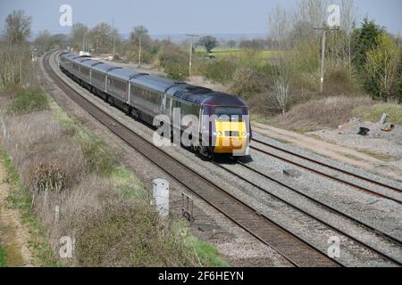 Arriva CrossCountry High Speed Train working an Edinburgh to Bristol Temple Meads express passing Elford loop on a sunny 31 March 2021 Stock Photo