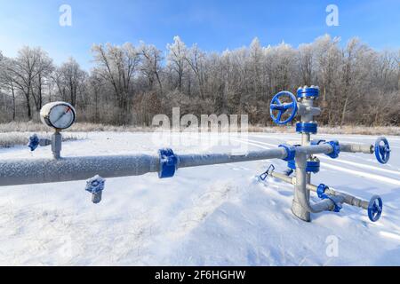 Winter pipeline transport is the long-distance transportation of a liquid or gas through a system of pipes—a pipeline—typically to a market area Stock Photo