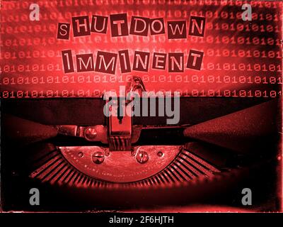 Shutdown Imminent, Mechanical Typewriter, Binary code background, Red tone, Vintage distorted look, Ransom note typography Stock Photo