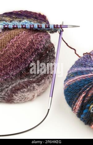 Knitting using  circular needles and yarn Stock Photo