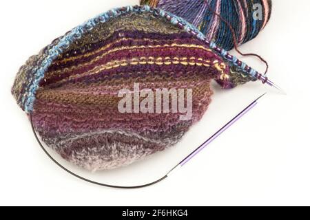 Knitting using  circular needles and yarn Stock Photo