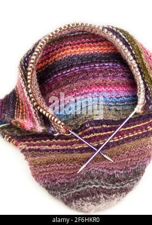 Knitting using  circular needles and yarn Stock Photo