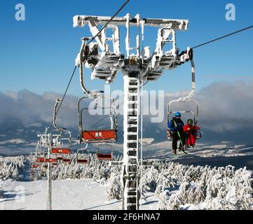 chair lift on Mount Serak for downhill skiers - Jesenik mountains or Jeseniky - Czech republic Stock Photo