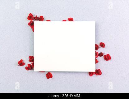 Floral and spring mockup, blank invitation wedding or greeting card with red leaves, flat lay composition photo Stock Photo