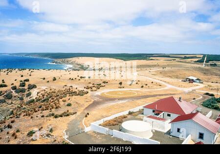 2001 Cape Willoughby ,Cape Willoughby Conservation Park, Kangaroo Island, South Australia. View from the top of Cape Willoughby lighthouse of the Cape Willoughby Lighthouse Keepers Heritage Accommodation and the Cape Willoughby Conservation Park .The original lighthouse keeper’s cottages were in a valley, half a kilometre from the lighthouse. There was fresh spring water here and it was close to the beach where supplies were landed. Due to deterioration over time and the hardship of reaching the lighthouse in bad weather, new keeper’s quarters were built much closer to the lighthouse in 1927. Stock Photo