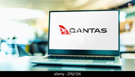 POZNAN, POL - MAR 15, 2021: Laptop computer displaying logo of Qantas Airways,  the flag carrier of Australia Stock Photo