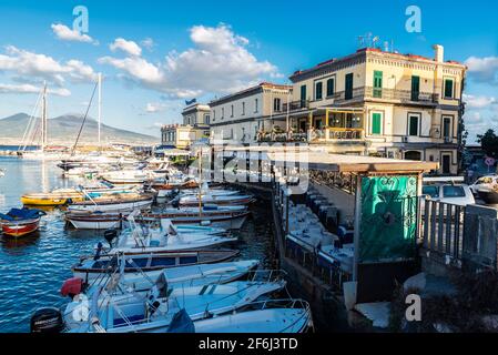 Naples, Italy - September 9, 2019: Sailboats, boats and yachts moored on the gulf of Naples in front of the Mount Vesuvius, Italy Stock Photo