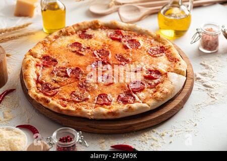 Fresh baked pepperoni pizza on white background Stock Photo