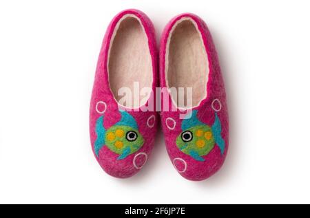 Felt slippers on white background in closeup Stock Photo
