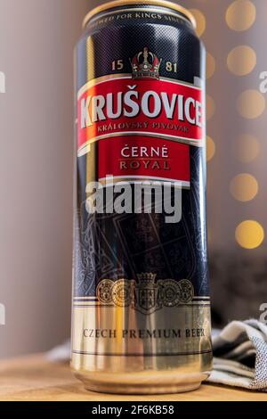 Tyumen, Russia-February 13, 2021: bottle of dark Krusovice Czech beer. logo. vertical photo Stock Photo